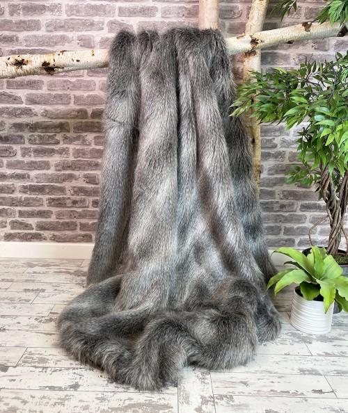 Long haired, grey striped fur blanket