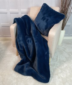 Electric blue faux fur blanket and cushion