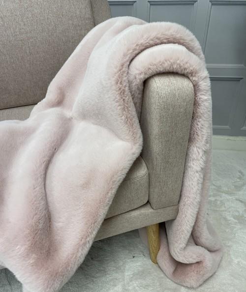 Pink faux fur sofa throw or bedspread