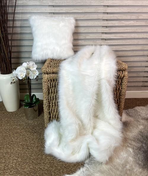 Pale cream fake fur bedspread with matching cushion