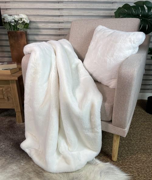 Large sofa throw in cream faux fur