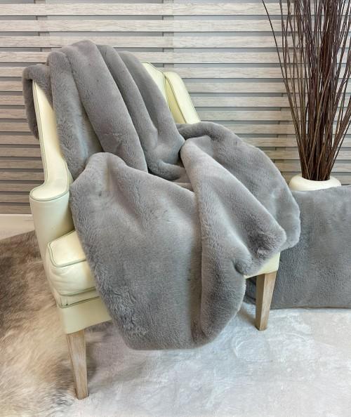 Extra large luxury faux fur throw in a pale taupe colour