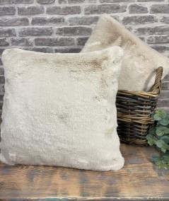 Short haired beige fur cushions