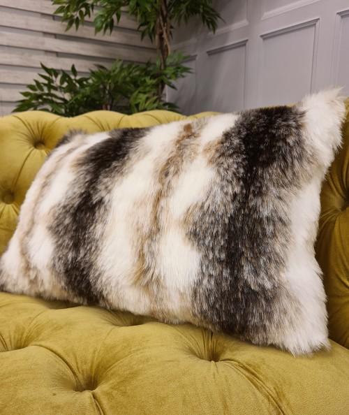 Brown and cream rectangular fur cushions