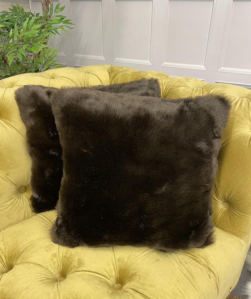 Dark brown fake fur cushions