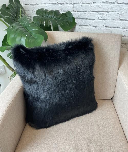 Black fur cushions