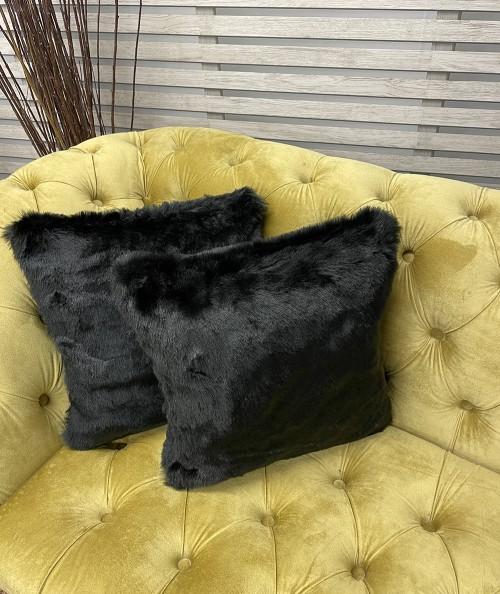 Economy cushions in short haired black fur