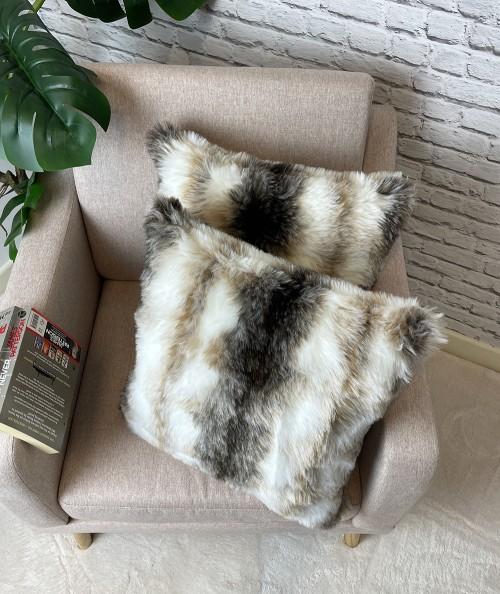 Furry cushions in white and brown stripes