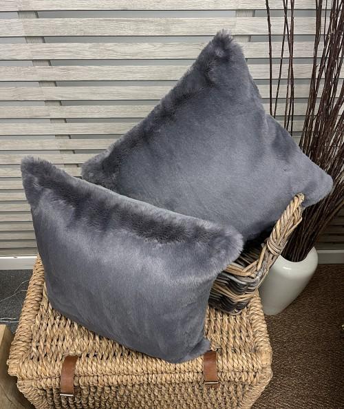 Grey fake fur cushions