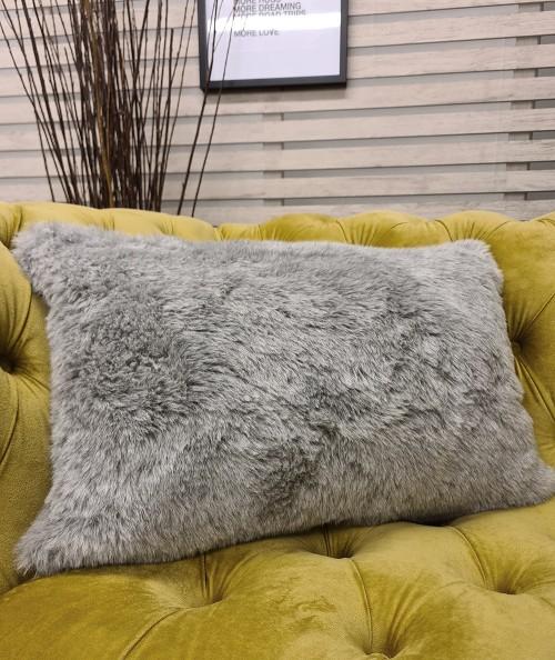 Plain coloured rectangular fur cushions