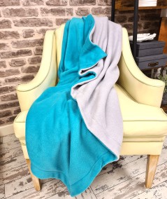 Reversible light grey and jade green fleece throw