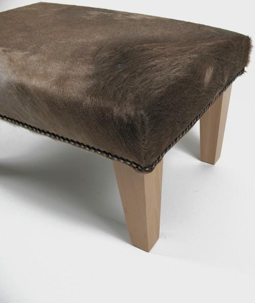 Small cow skin footstool in light brown 311