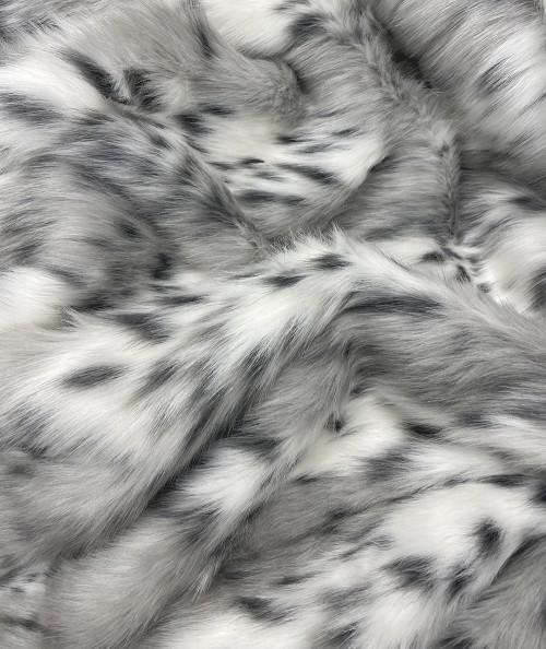 Close up image of the spotted lynx faux fur fabric