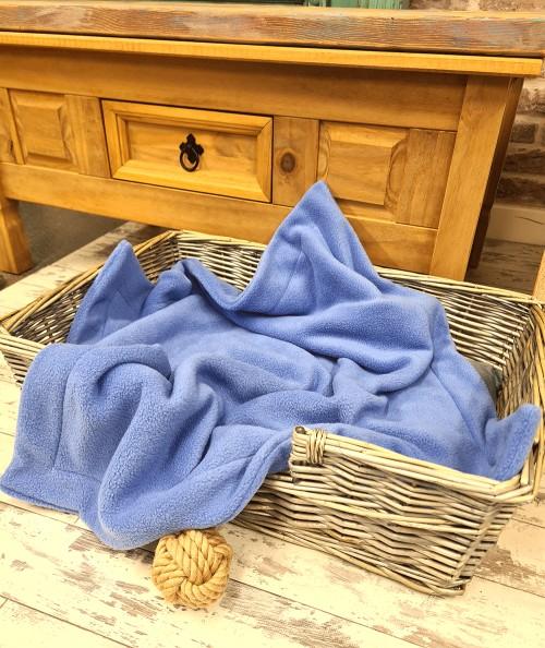 Soft, blue fleecy dog blanket