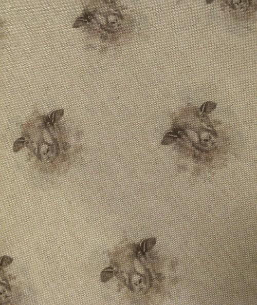 Close up of the small sheep printed fabric