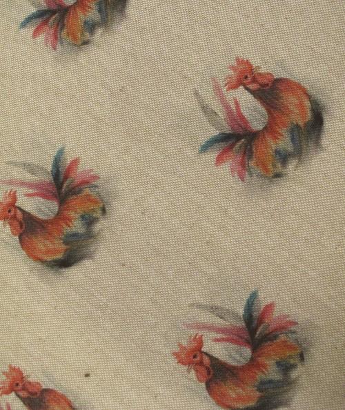 Close up image of the small rooster seat pad fabric