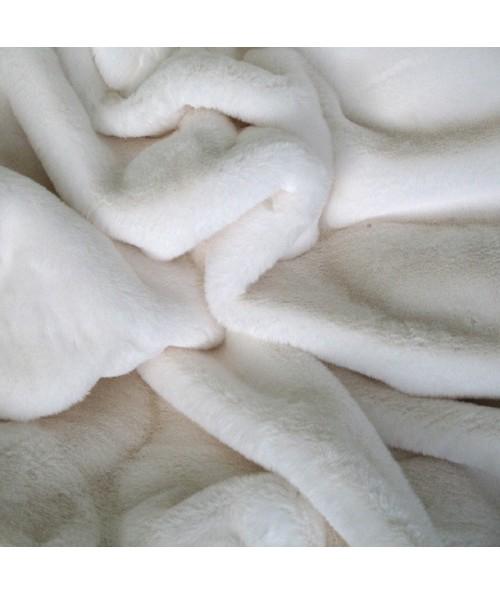 Close up image of luxury cream faux fur fabric